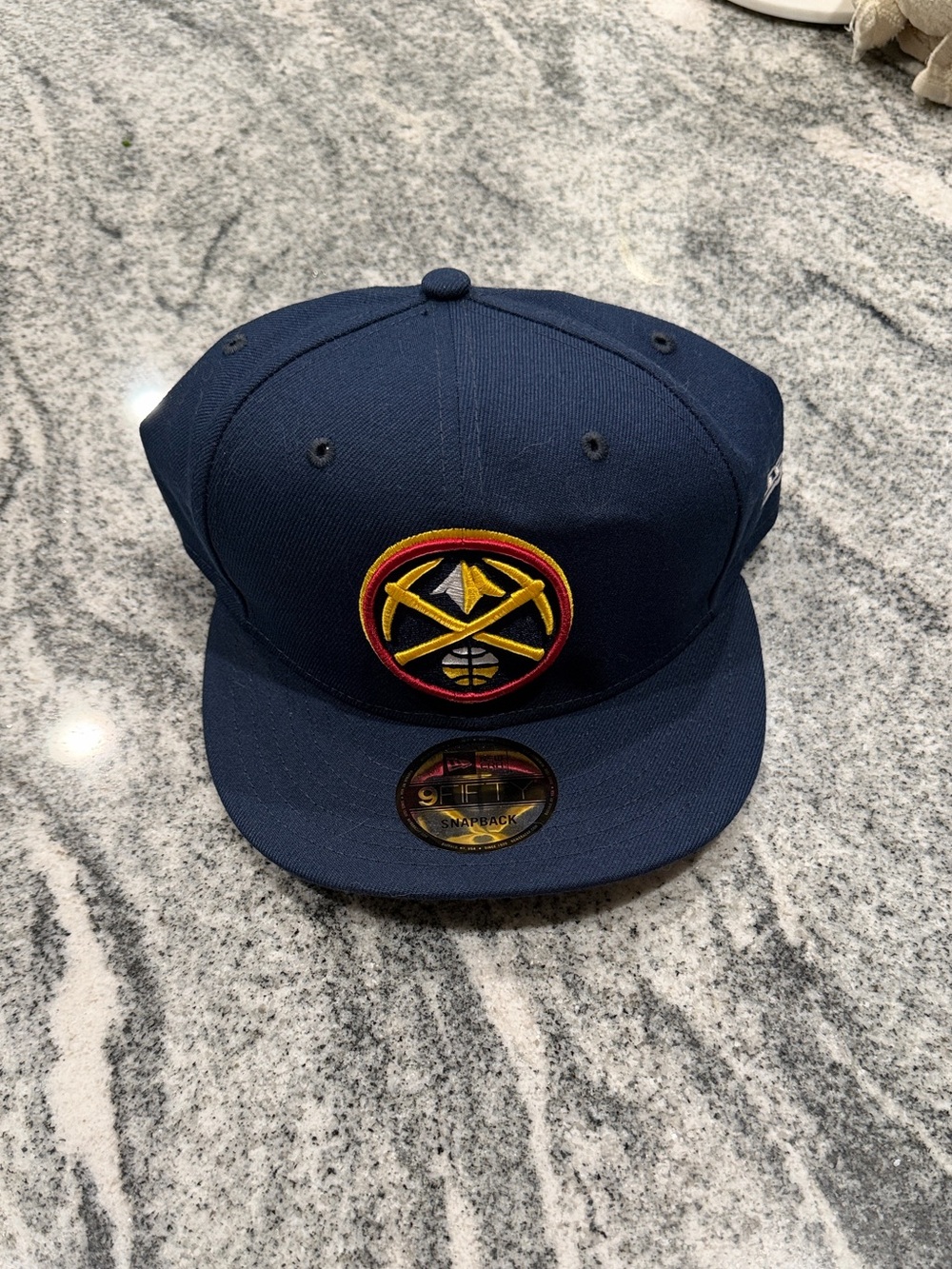 New Era Navy Denver Nuggets Snapback with Yellow & Red Crest